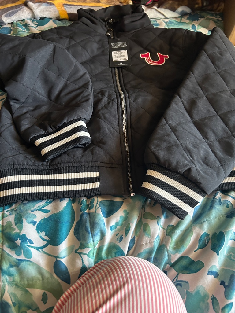 True Religion Women’s Quilted Black Puffer Jacket With Red Logo.